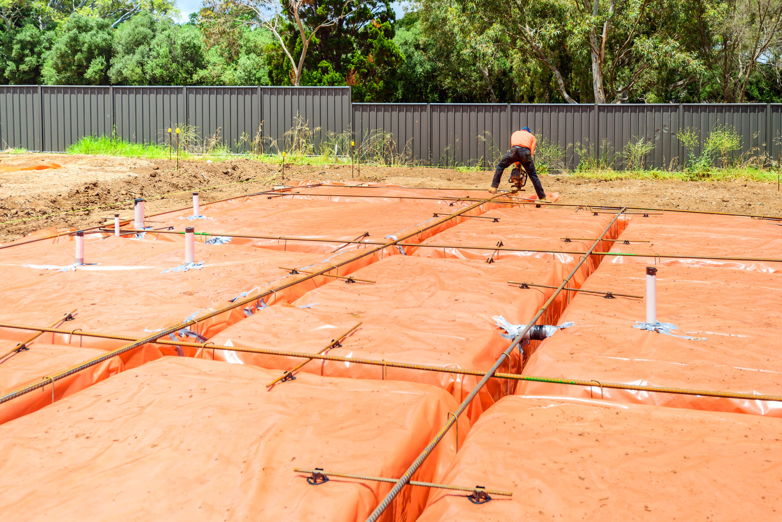 Australian builder performing steel fixing works of a new suburban house