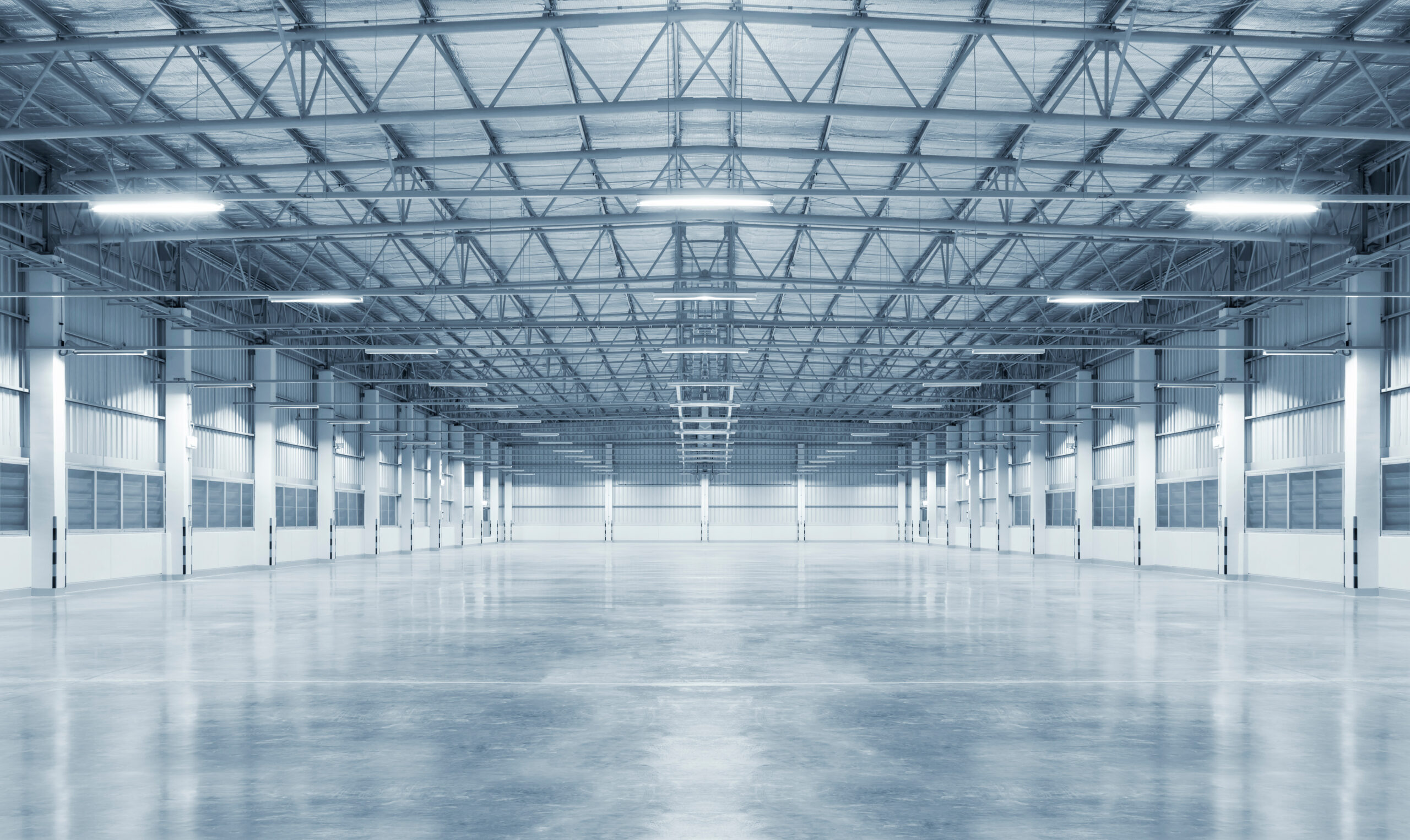 Factory background with concrete floor, night scene.